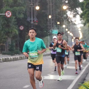 Race photo from BAUR RUN 2025