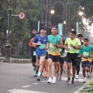Race photo from BAUR RUN 2025