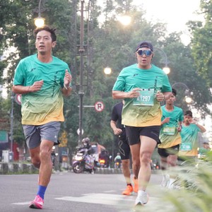 Race photo from BAUR RUN 2025