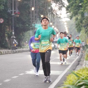 Race photo from BAUR RUN 2025
