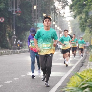 Race photo from BAUR RUN 2025
