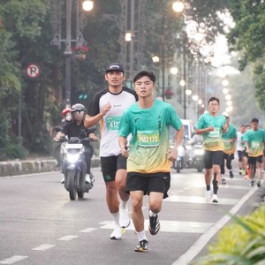 Race photo from BAUR RUN 2025