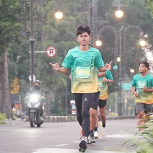 Race photo from BAUR RUN 2025