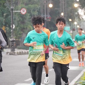 Race photo from BAUR RUN 2025