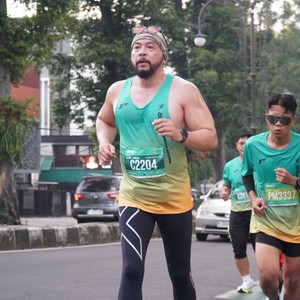 Race photo from BAUR RUN 2025