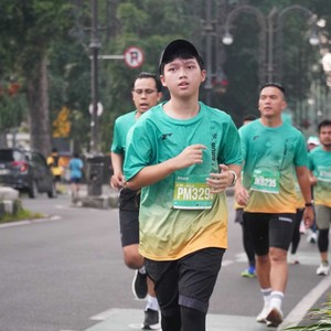 Race photo from BAUR RUN 2025