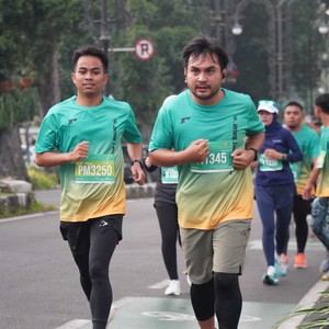 Race photo from BAUR RUN 2025