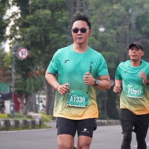 Race photo from BAUR RUN 2025