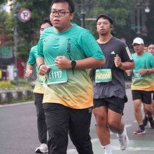 Race photo from BAUR RUN 2025
