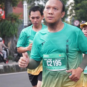 Race photo from BAUR RUN 2025