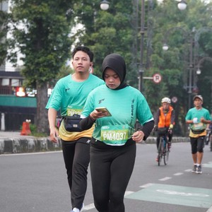 Race photo from BAUR RUN 2025
