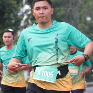 Race photo from BAUR RUN 2025