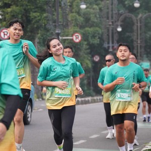 Race photo from BAUR RUN 2025