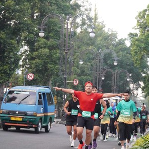 Race photo from BAUR RUN 2025