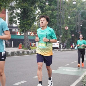 Race photo from BAUR RUN 2025