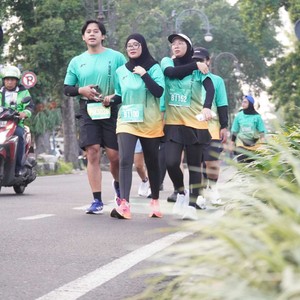 Race photo from BAUR RUN 2025
