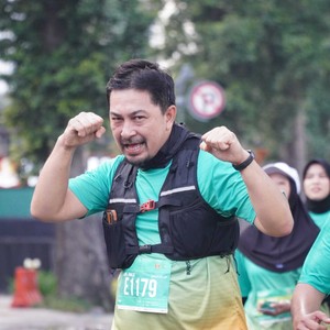 Race photo from BAUR RUN 2025