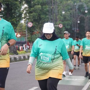 Race photo from BAUR RUN 2025