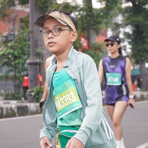 Race photo from BAUR RUN 2025