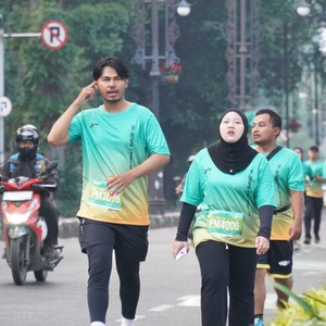 Race photo from BAUR RUN 2025
