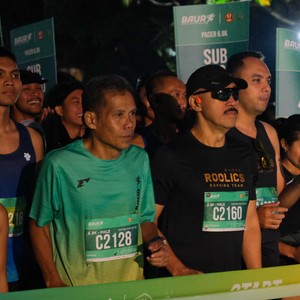 Race photo from BAUR RUN 2025