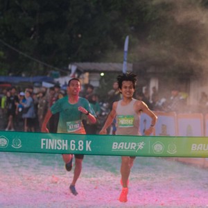 Race photo from BAUR RUN 2025