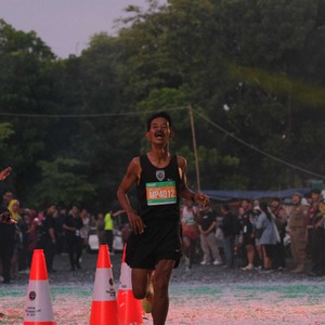 Race photo from BAUR RUN 2025