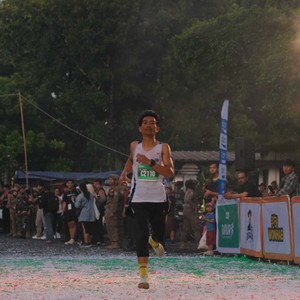 Race photo from BAUR RUN 2025