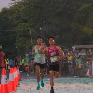 Race photo from BAUR RUN 2025