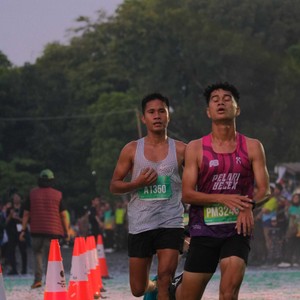 Race photo from BAUR RUN 2025