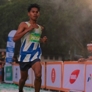 Race photo from BAUR RUN 2025
