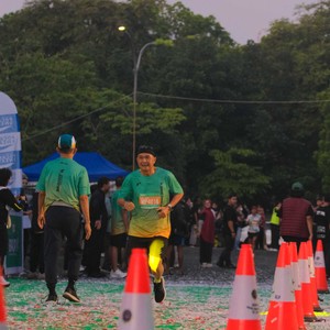 Race photo from BAUR RUN 2025