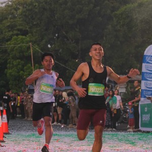 Race photo from BAUR RUN 2025