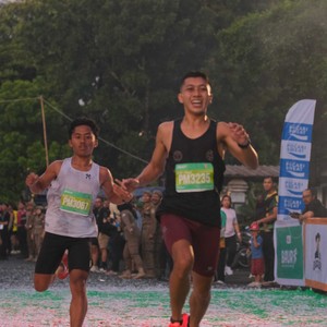 Race photo from BAUR RUN 2025