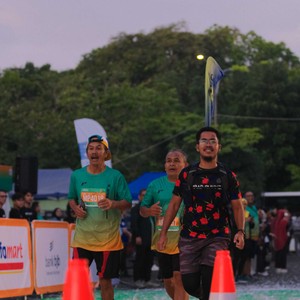 Race photo from BAUR RUN 2025