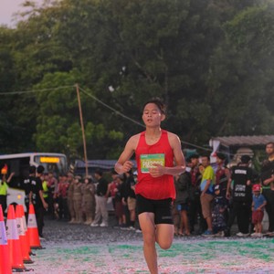 Race photo from BAUR RUN 2025