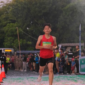 Race photo from BAUR RUN 2025
