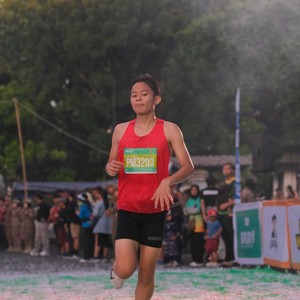 Race photo from BAUR RUN 2025