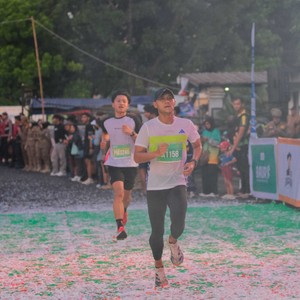 Race photo from BAUR RUN 2025