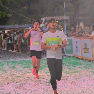 Race photo from BAUR RUN 2025