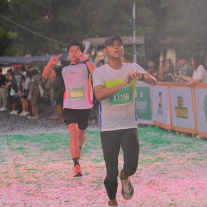 Race photo from BAUR RUN 2025