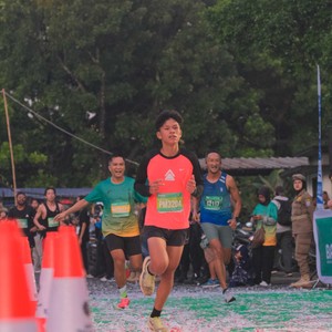 Race photo from BAUR RUN 2025