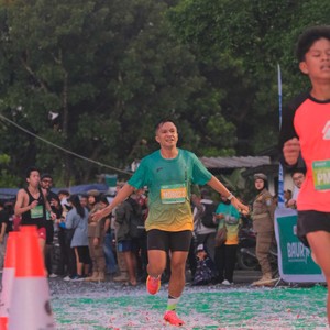 Race photo from BAUR RUN 2025