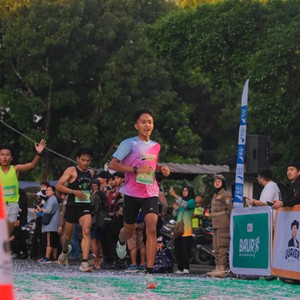 Race photo from BAUR RUN 2025