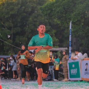 Race photo from BAUR RUN 2025