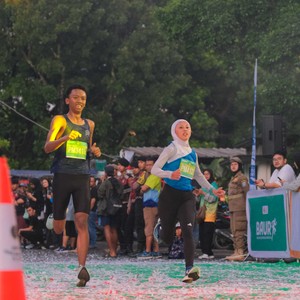 Race photo from BAUR RUN 2025