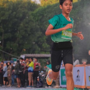 Race photo from BAUR RUN 2025