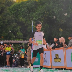 Race photo from BAUR RUN 2025