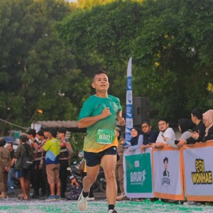 Race photo from BAUR RUN 2025