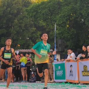 Race photo from BAUR RUN 2025
